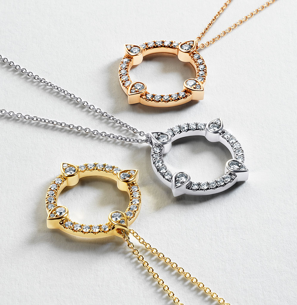 silver and gold necklaces with diamonds