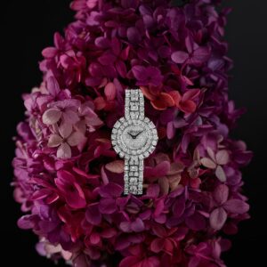silver watch on a flower